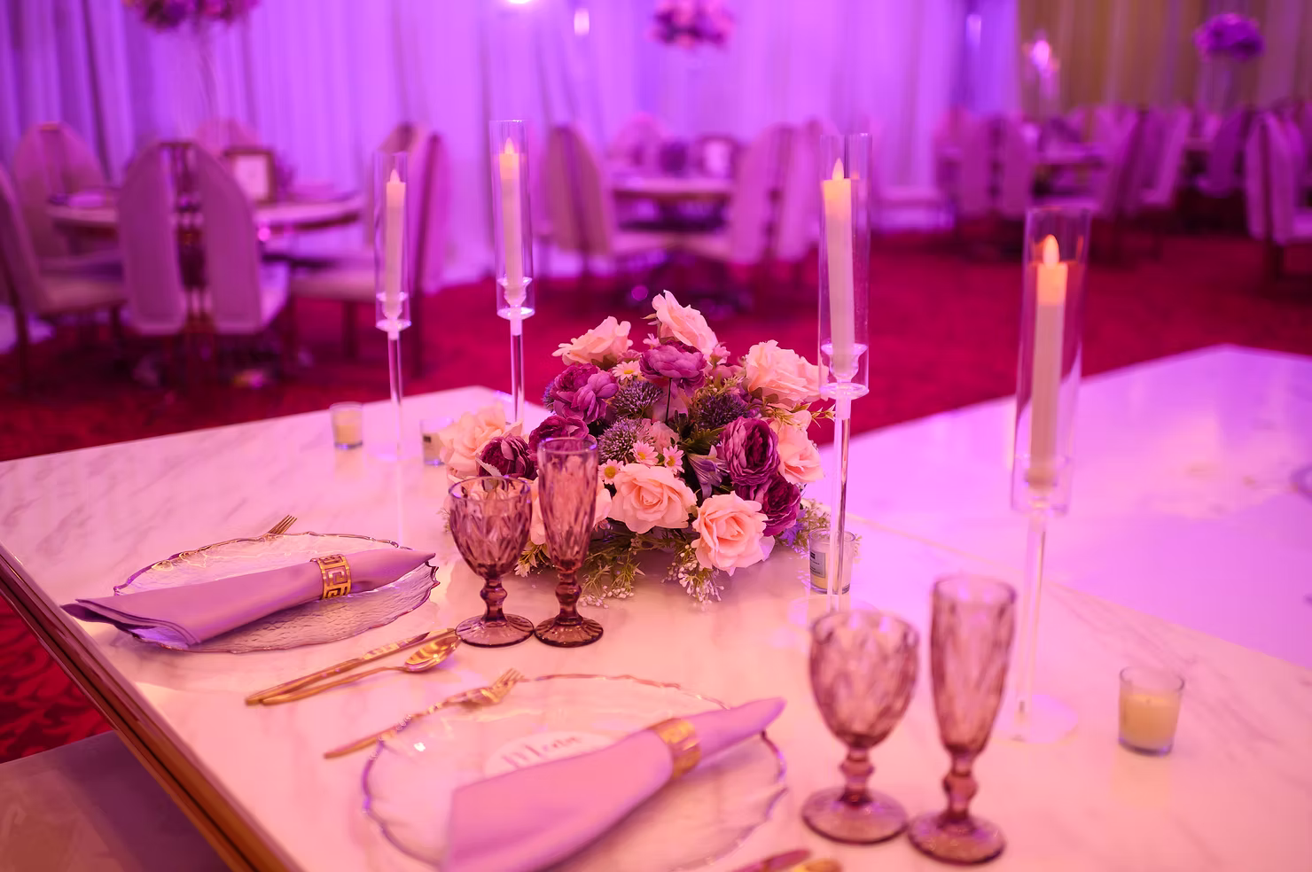 Floral wedding centrepiece on a set reception table